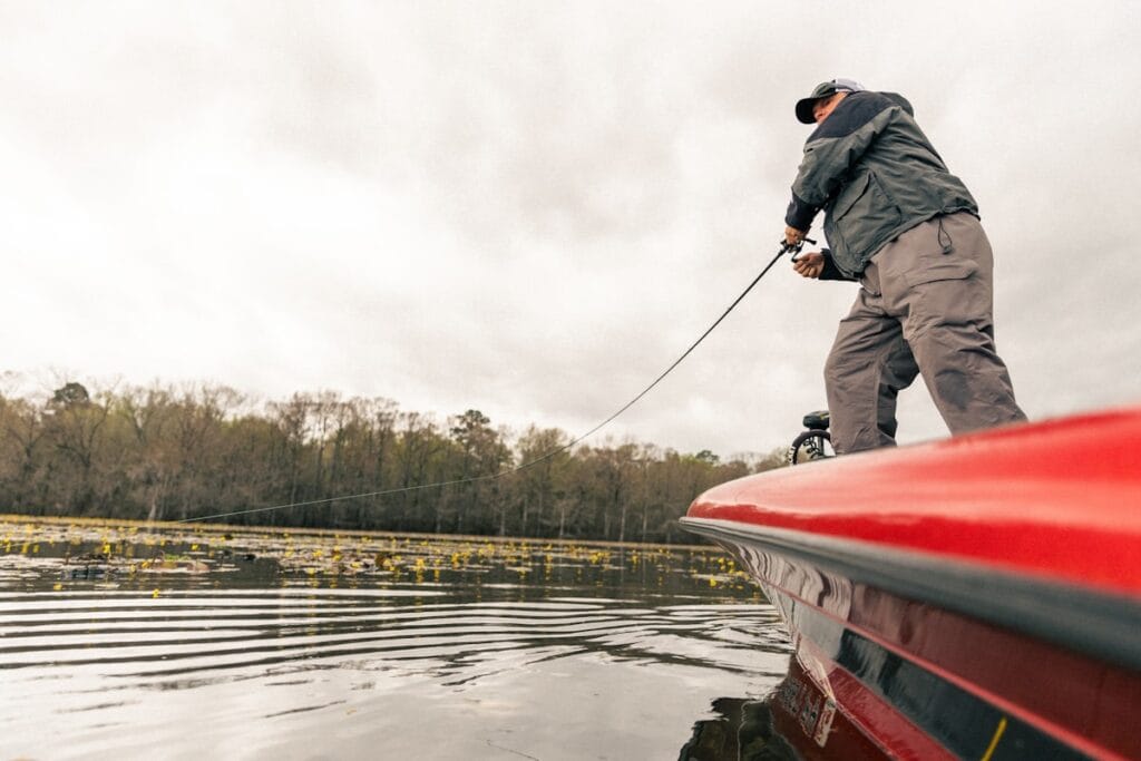 Angler fishing near bluegill beds during the spawn season