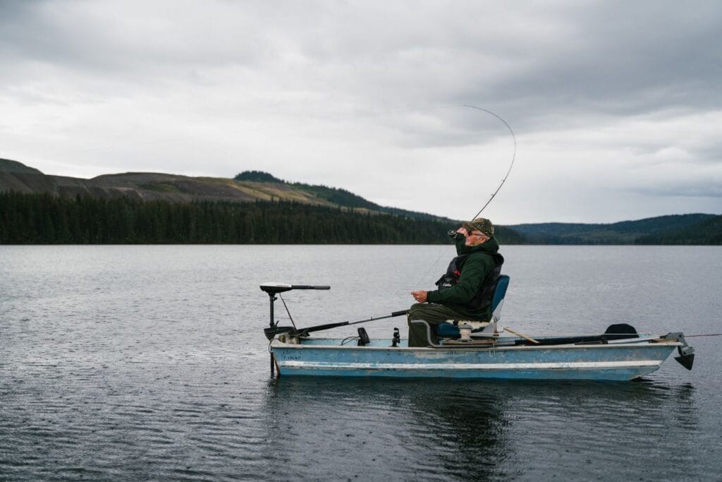 Angler fishing a quiet lake