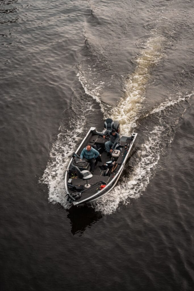 Anglers fishing offshore structure from a boat